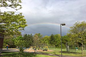 photo of rainbow over East School playground